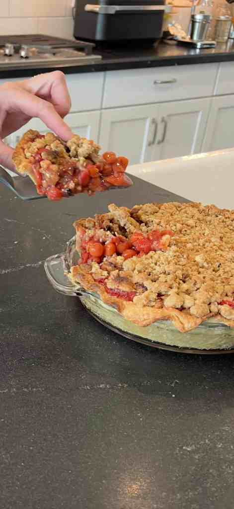 Juicy cherries, a flaky crust, and a buttery Dutch crumb topping—this cherry pie is comfort in every bite.